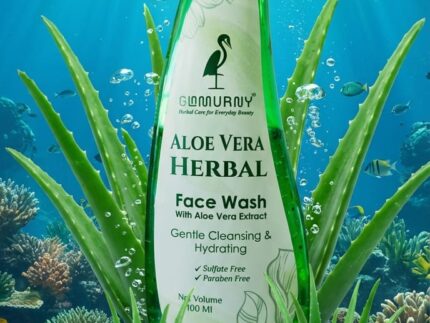 GLAMURNY Aloe Vera Herbal Face Wash bottle in a fresh water environment with aloe plants symbolizing hydration and natural skincare.