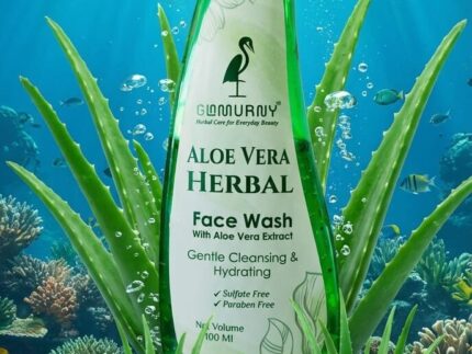 GLAMURNY Aloe Vera Herbal Face Wash bottle in a fresh water environment with aloe plants symbolizing hydration and natural skincare.