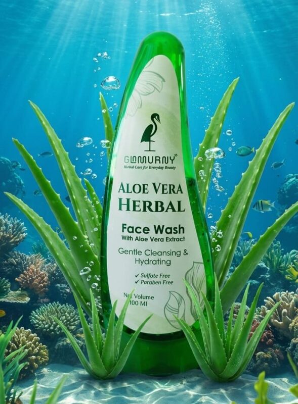 GLAMURNY Aloe Vera Herbal Face Wash bottle in a fresh water environment with aloe plants symbolizing hydration and natural skincare.